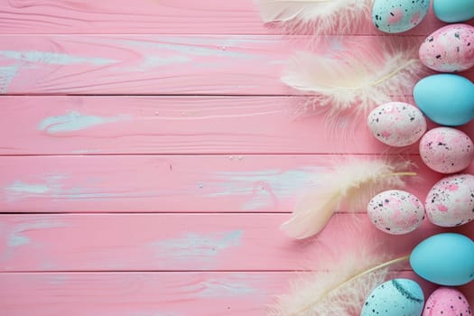 White Easter eggs and soft feathers with pink flowers on a wooden background.