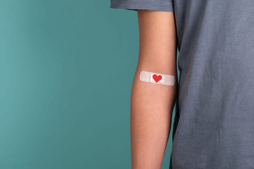 Arm with plaster and heart, blood cells, donate plasma, world blood donor day, health care, transfusion, Leukaemia disease