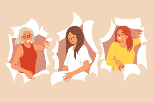 Cheerful women promoters peek out of hole in banner to advertise promotion in store. Happy girlfriends or sisters in casual clothes invite to celebrate international women day on march 8