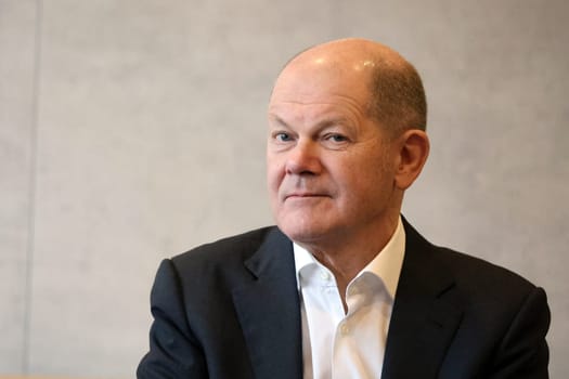 Federal Chancellor Olaf Scholz during a visit to the Europa Park Stadium in Freiburg with the participants in the dialogue with socially engaged citizens from Freiburg and the surrounding area in the Business Lounge on the ground floor of the main grandstand