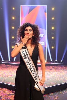 Hand kiss to the audience: Apameh Schönauer (Berlin),39 years,successful architect and activist for women's rights wins the election of the Miss Germany Award 2024 - Europapark Rust - The final at Europapark Rust - On Saturday,04 March 2023,the title "Miss Germany"" was awarded for the 20th time in Europapark. 900 guests attended the proclamation at the DOME,and more than 100 media representatives from the press,radio and television were accredited."