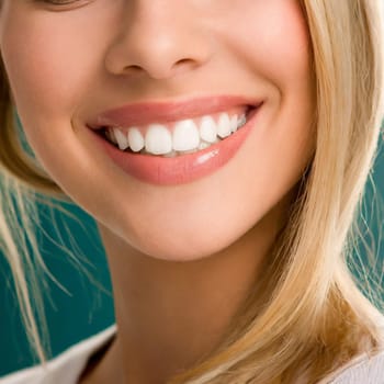 Close Up of Smiling Woman Mouth with Healthy, Beautiful, White Teeth. Dental Clinic Concept.