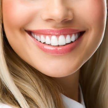 Close Up of Smiling Woman Mouth with Healthy, Beautiful, White Teeth. Dental Clinic Concept.