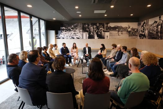 Federal Chancellor Olaf Scholz (SPD) with participants in the dialogue with socially engaged citizens from Freiburg and the surrounding area in the Business Lounge on the ground floor of the main stand of the Europa Park Stadium