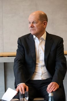 Federal Chancellor Olaf Scholz during a visit to the Europa Park Stadium in Freiburg with the participants in the dialogue with socially engaged citizens from Freiburg and the surrounding area in the Business Lounge on the ground floor of the main grandstand