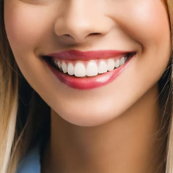 Dental health concept: woman smiling close up. Isolated on white.