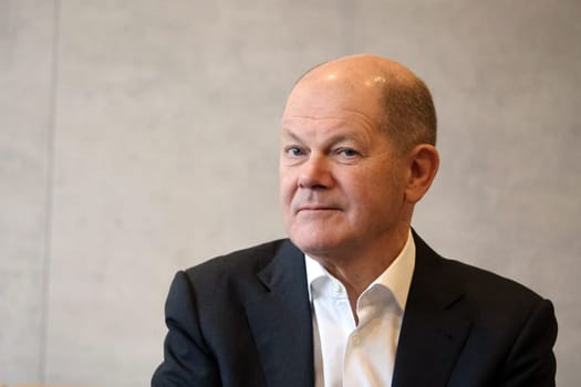 Federal Chancellor Olaf Scholz during a visit to the Europa Park Stadium in Freiburg with the participants in the dialogue with socially engaged citizens from Freiburg and the surrounding area in the Business Lounge on the ground floor of the main grandstand