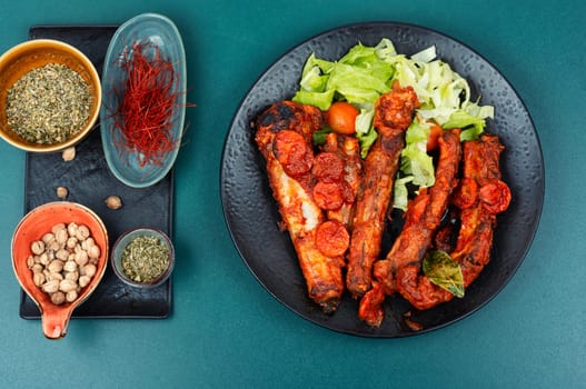 Braised pork ribs in tomato sauce. BBQ. Stew.