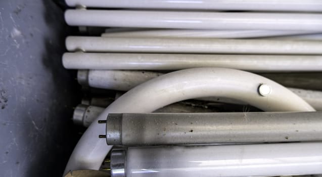 Detail of old damaged and discarded light bulbs, recycling