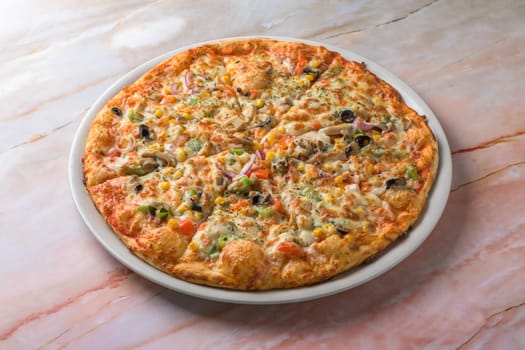 delicious vegetarian pizza on wood.