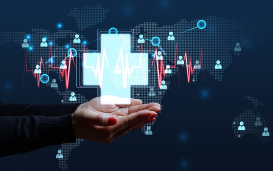 Introducing innovations in medicine around the world. Development of the healthcare sector using technological advances. Hand on the background of a world map