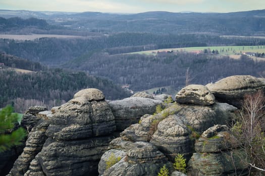 View from the Pfaffenstein in black and white. Forests, mountains, vastness, panorama. Landscape from the Elbe Sandstone Mountains.