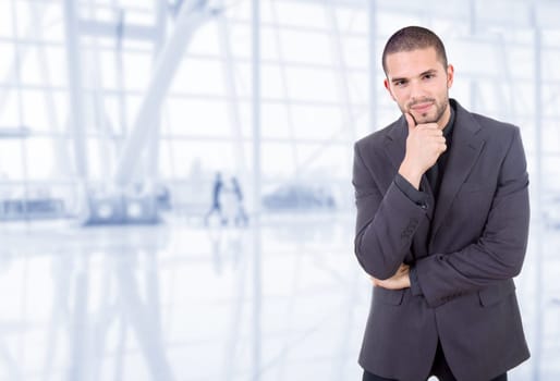 young business man portrait at the office