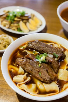 Spicy red soup beef noodle in a bowl