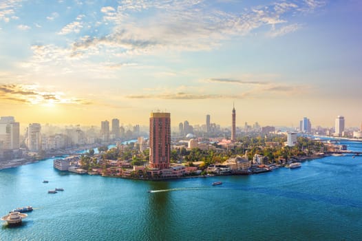 Gezira island in the Nile river at sunset, exclusive aerial view of Cairo, Egypt.