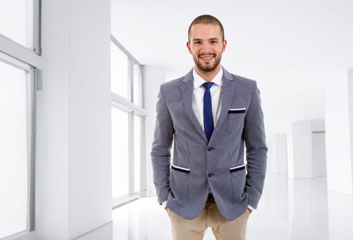 young business man portrait at the office