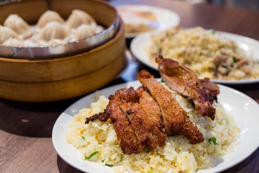 Fried pork chop with fried rice in restaurant