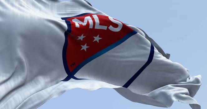 New York, US, Oct. 20 2023: Close-up of the Major League Soccer flag waving in the wind. Top professional men soccer league in North America. Illustrative editorial 3d illustration render