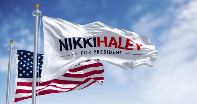 Washington D.C., US, Feb. 15 2024: Nikki Haley election campaign and the american flags waving on a clear day. Illustrative editorial 3d illustration render. 2024 United States presidential election