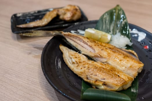 Grill fish on the dish in Japanese restaurant