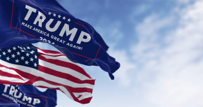 Arlington, US, oct. 22 2023: Donald Trump 2024 presidential campaign flag waving with american flag waving together. 2024 US presidential election. Illustrative editorial 3d illustration render