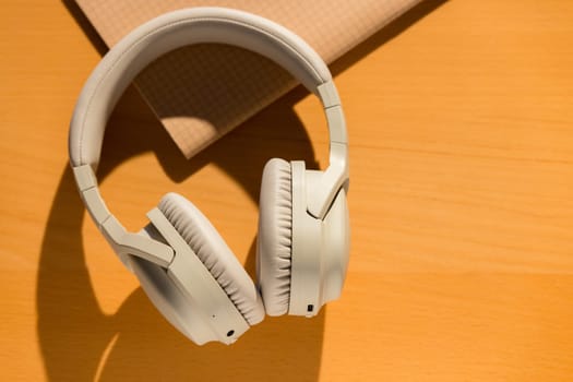 Headphone on the table with shadow