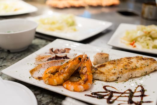 Seafood teppanyaki with fish shrimp and squid