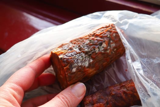 Raw smoked sausage became moldy while it was in a plastic bag. A mold or mould. The dust-like, colored appearance of molds is due to the formation of spores containing fungal secondary metabolites
