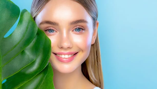 Beauty Spa Woman with a Fresh Leaf over Face