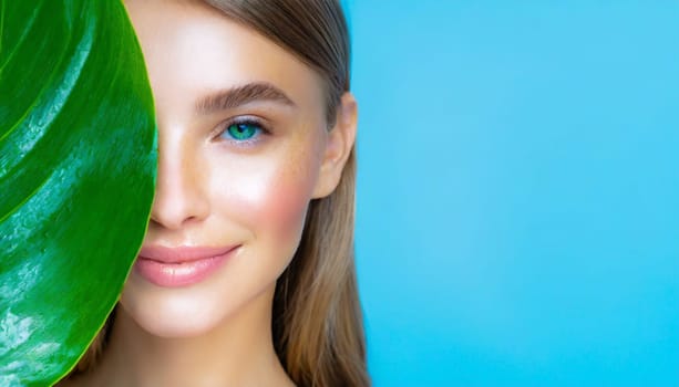 Beauty Spa Woman with a Fresh Leaf over Face