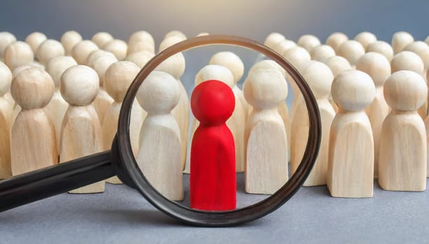 Wooden figures of people are lying on a white background. Social network. Business. The concept of human resources management. Headhunters. Search for people to work. The search for the second half.