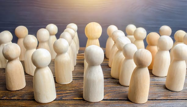Wooden figures of people are lying on a white background. The search for the second half. Social network. Business. The concept of human resources management. Headhunters. Search for people to work