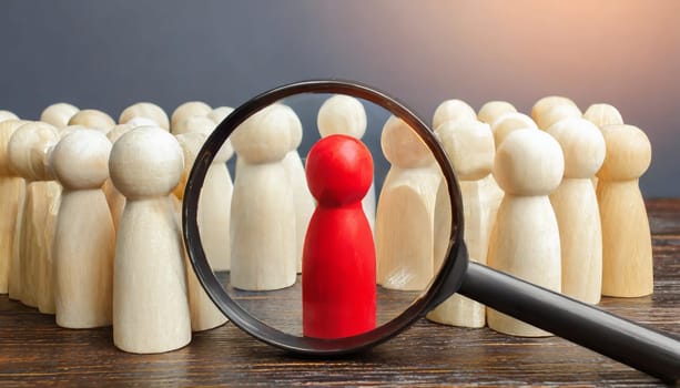 Wooden figures of people are lying on a white background. Social network. Business. The concept of human resources management. Headhunters. Search for people to work. The search for the second half.