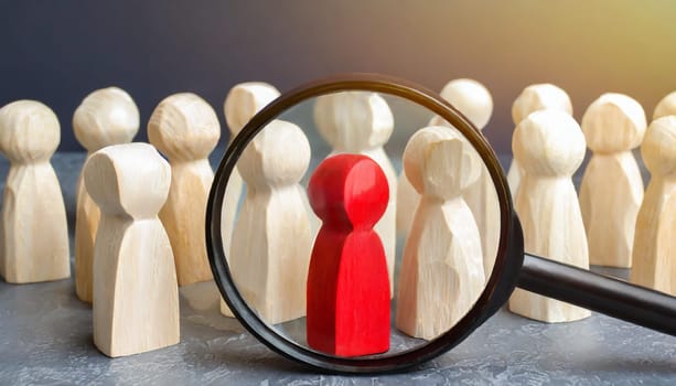 Wooden figures of people are lying on a white background. Social network. Business. The concept of human resources management. Headhunters. Search for people to work. The search for the second half.