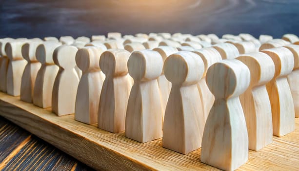 Wooden figures of people are lying on a white background. The search for the second half. Social network. Business. The concept of human resources management. Headhunters. Search for people to work