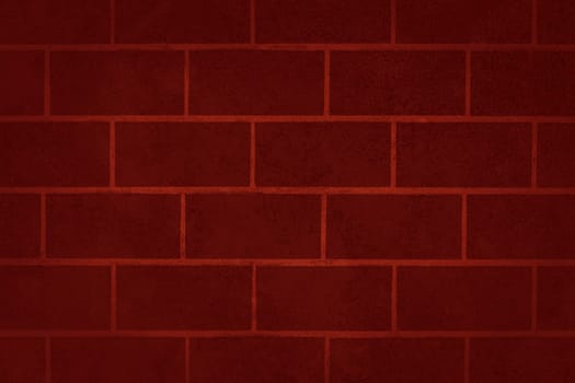 The rough brick wall is red in color. Texture or background
