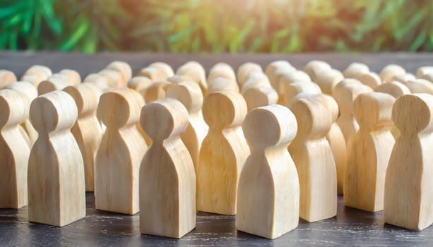 Wooden figures of people are lying on a white background. The search for the second half. Social network. Business. The concept of human resources management. Headhunters. Search for people to work