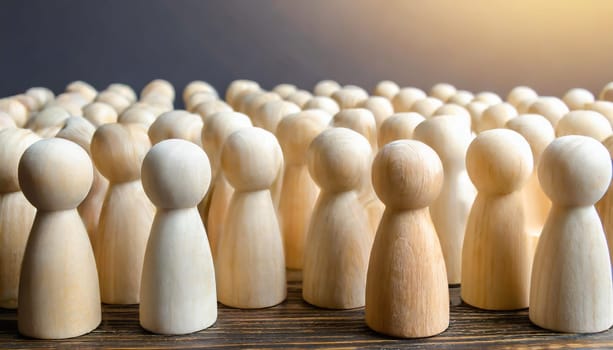 Wooden figures of people are lying on a white background. The search for the second half. Social network. Business. The concept of human resources management. Headhunters. Search for people to work