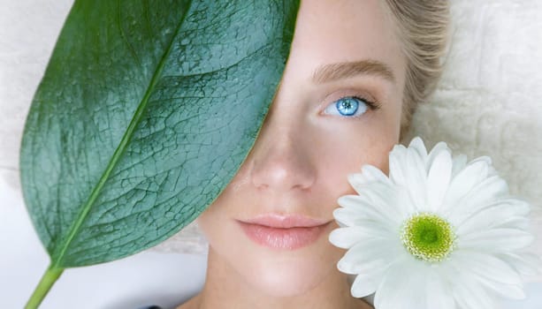 Skincare, mask for eyes and face of woman on blue background for wellness, cosmetics and facial treatment. Beauty, luxury spa and girl relax with eye pads for dermatology, healthy skin and self care