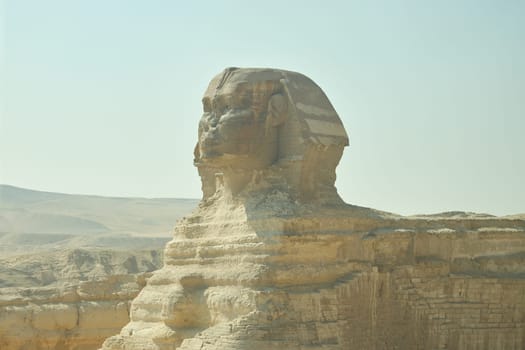 Great Sphinx of Giza. Statue of a mythical creature. Monumental sculpture in Egypt. Most visited Egyptian landmark. Vacation destination. Historic site. Tours and sightseeing