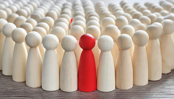 Wooden figures of people are lying on a white background. The search for the second half. Social network. Business. The concept of human resources management. Headhunters. Search for people to work