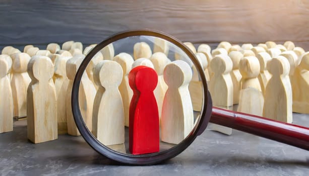 Wooden figures of people are lying on a white background. Social network. Business. The concept of human resources management. Headhunters. Search for people to work. The search for the second half.