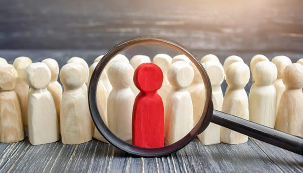 Wooden figures of people are lying on a white background. Social network. Business. The concept of human resources management. Headhunters. Search for people to work. The search for the second half.