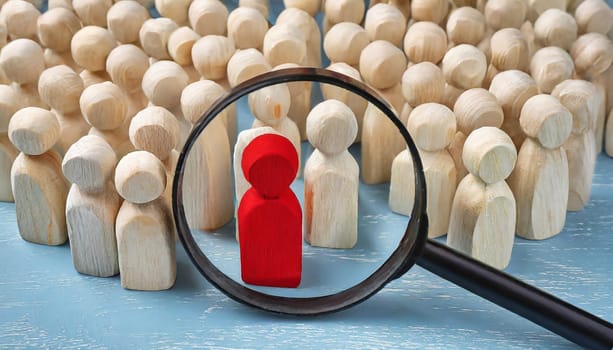 Wooden figures of people are lying on a white background. Social network. Business. The concept of human resources management. Headhunters. Search for people to work. The search for the second half.
