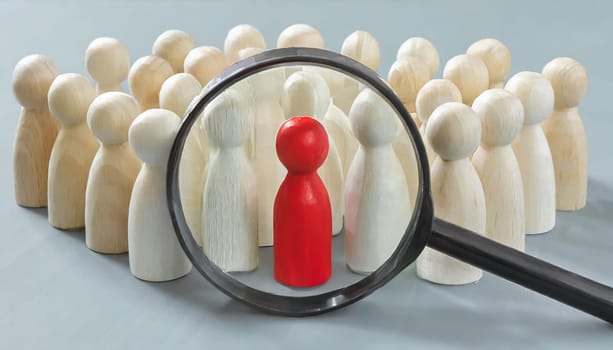 Wooden figures of people are lying on a white background. Social network. Business. The concept of human resources management. Headhunters. Search for people to work. The search for the second half.