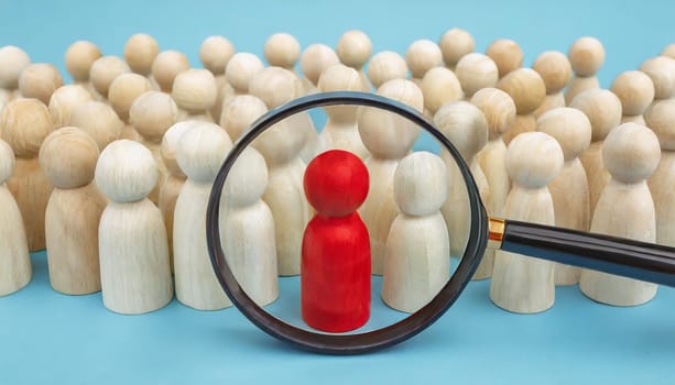 Wooden figures of people are lying on a white background. Social network. Business. The concept of human resources management. Headhunters. Search for people to work. The search for the second half.
