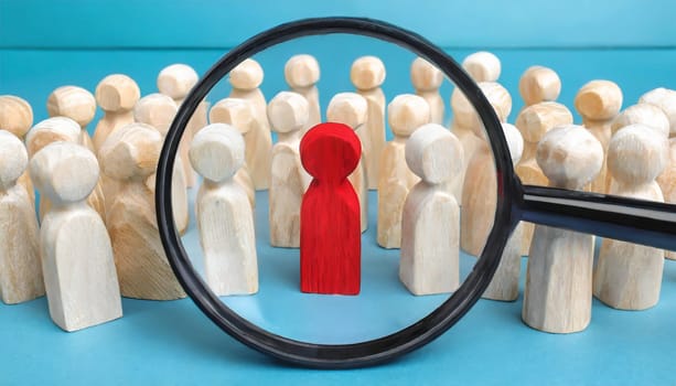 Wooden figures of people are lying on a white background. Social network. Business. The concept of human resources management. Headhunters. Search for people to work. The search for the second half.