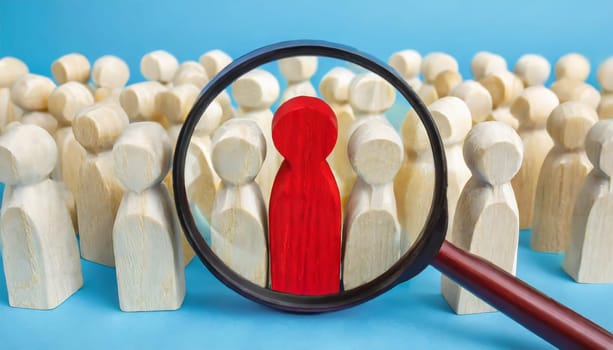 Wooden figures of people are lying on a white background. Social network. Business. The concept of human resources management. Headhunters. Search for people to work. The search for the second half.