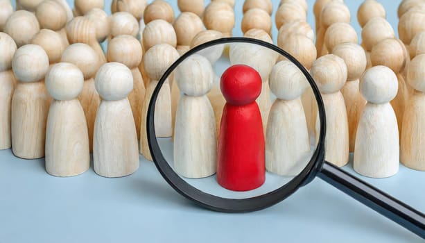 Wooden figures of people are lying on a white background. Social network. Business. The concept of human resources management. Headhunters. Search for people to work. The search for the second half.