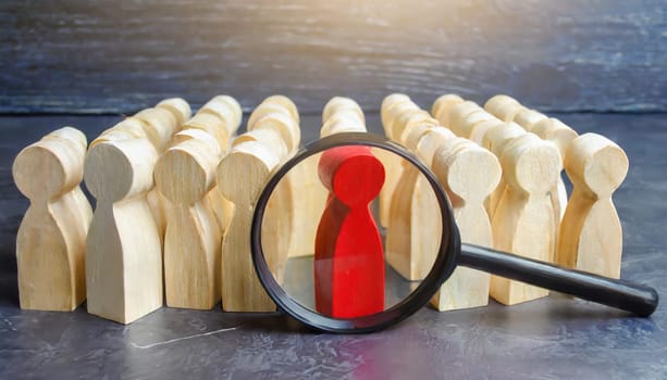 Wooden figures of people are lying on a white background. Social network. Business. The concept of human resources management. Headhunters. Search for people to work. The search for the second half.
